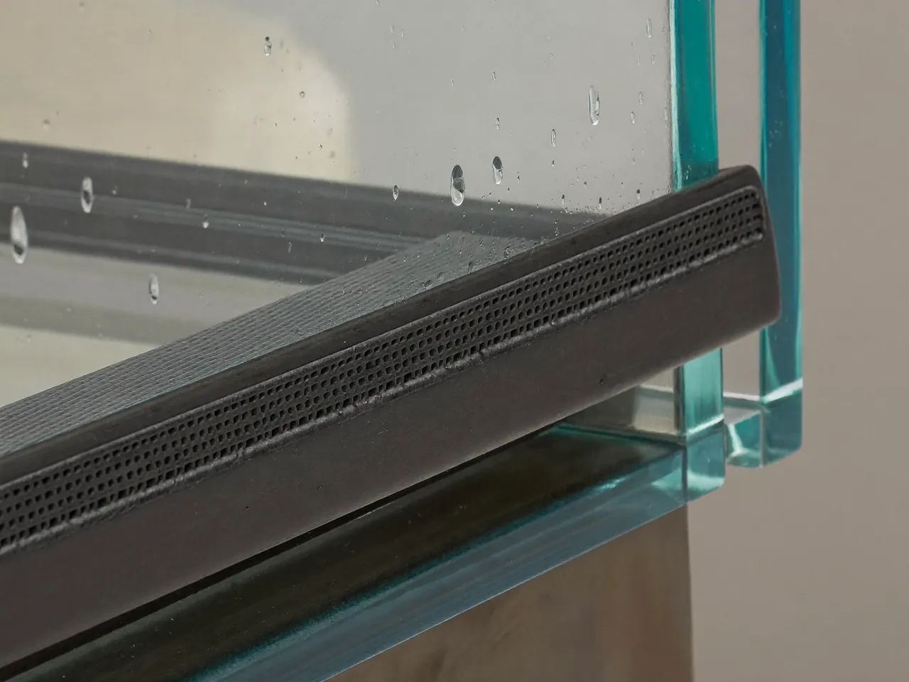 Warm-edge spacer bar detail on the edge of a glass unit